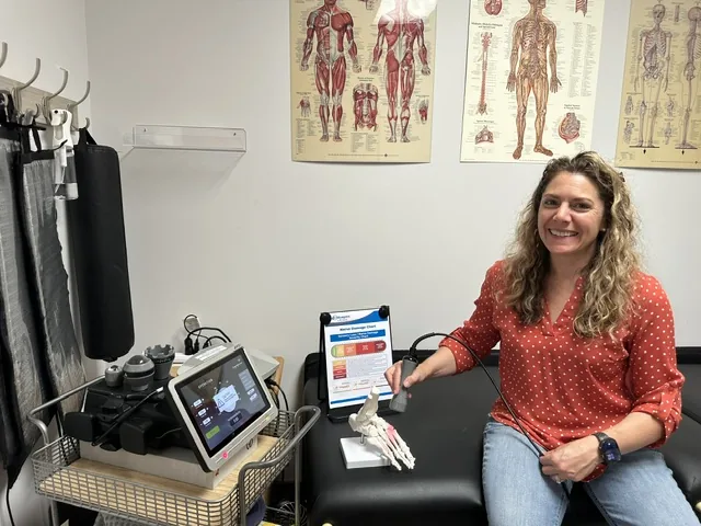 Dr. Elizabeth Johnsen with the Class IV laser at the clinic