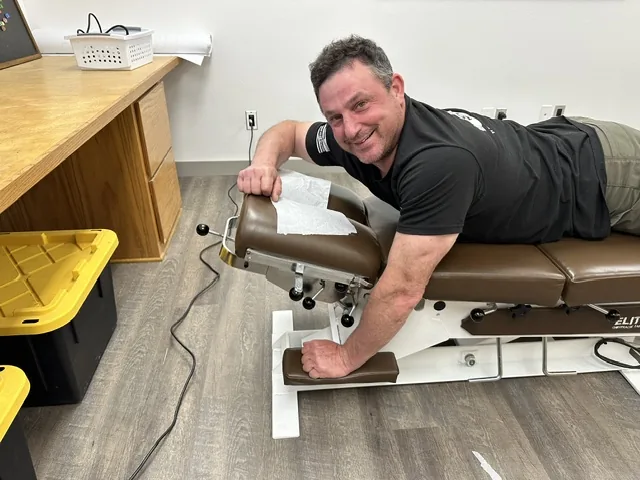 A patient on the drop table at Spine and Scoliosis Clinic